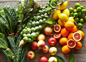 a group of fruits and vegetables on a wood surface Healthy Weight Loss Diets Camden